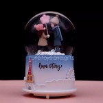 Couple Glowing Snow Crystal Ball Music