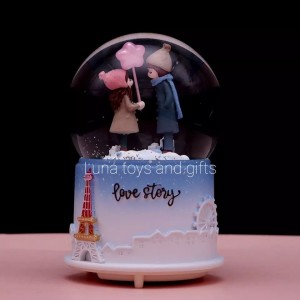 Couple Glowing Snow Crystal Ball Music